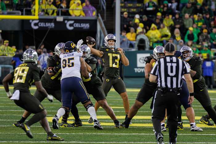 Oregon Ducks quarterback Ty Thompson throws a pass against the California Golden Bears.